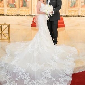 Eve of Milady wedding dress. Size 8, cathedral train, originally $6500.